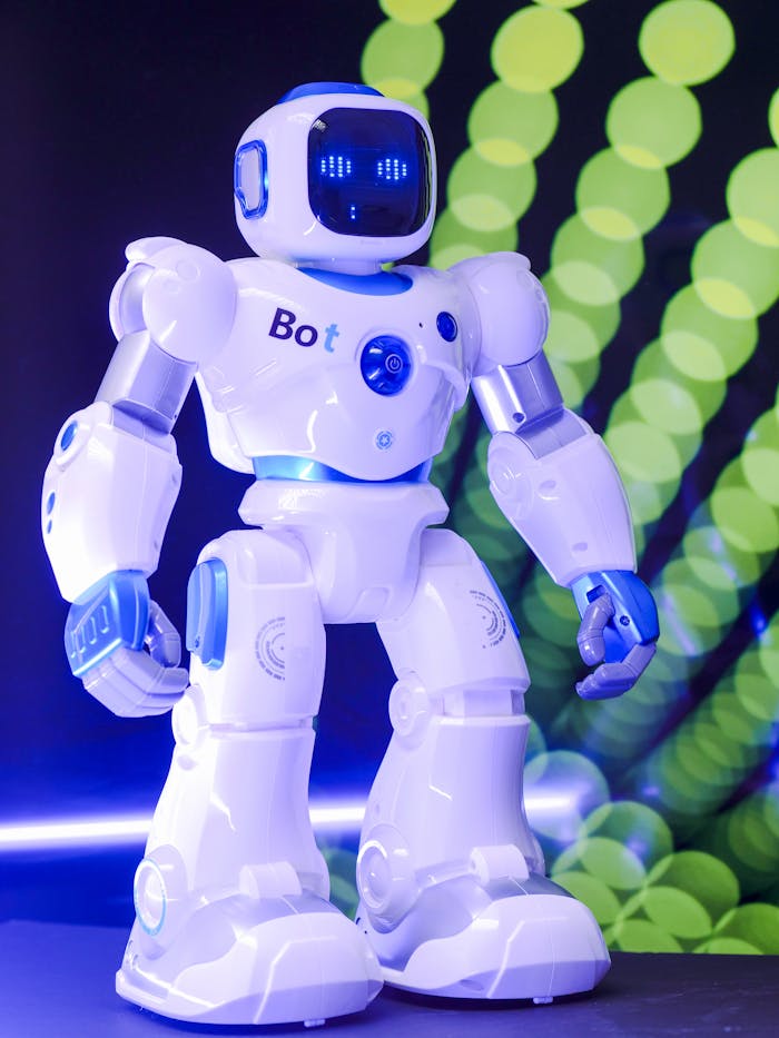 Services-02 High-tech humanoid robot with glowing LED display and futuristic design.