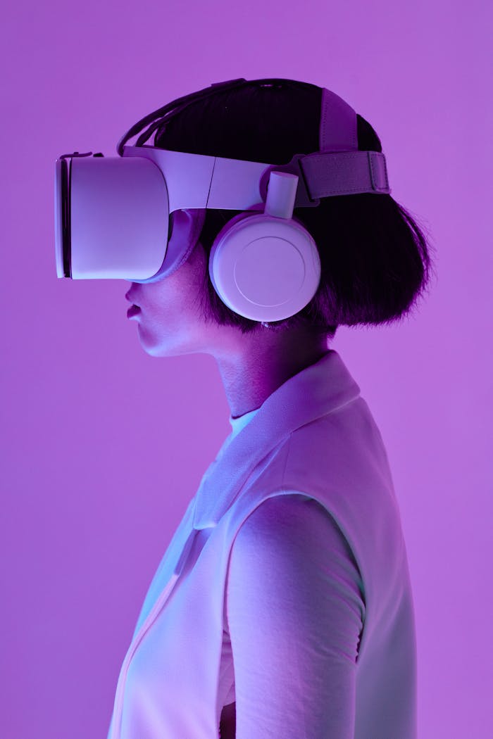 digital Side profile of a woman wearing VR goggles in a studio with purple lighting, embodying future tech.